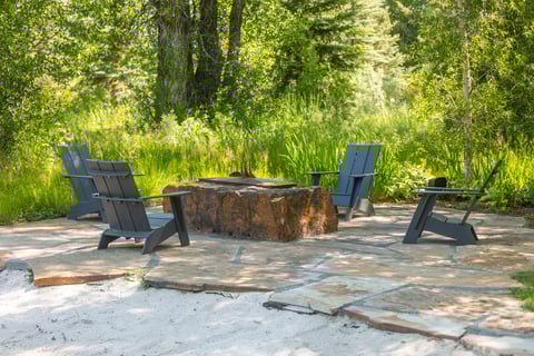 flagstone patio fire pit furniture woods native wild area