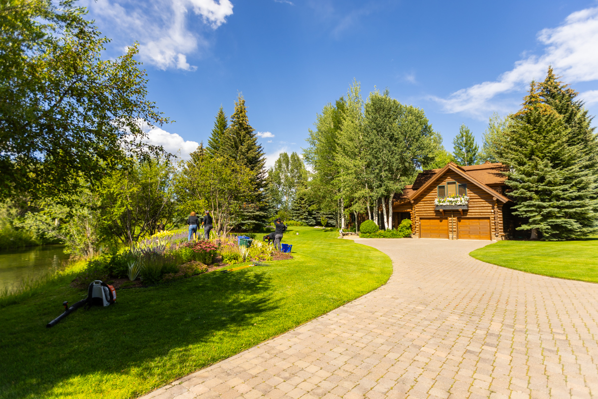 paver driveway nice lawn trees crew