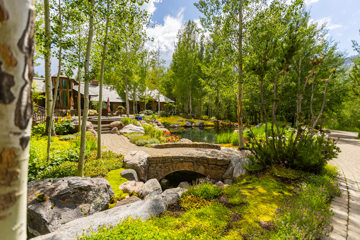 pond planting beds trees perennials mulch nice house 2