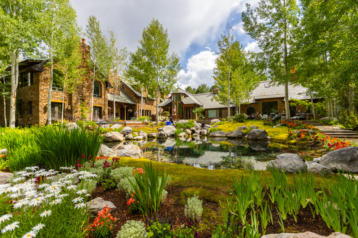 pond planting beds trees perennials mulch nice house